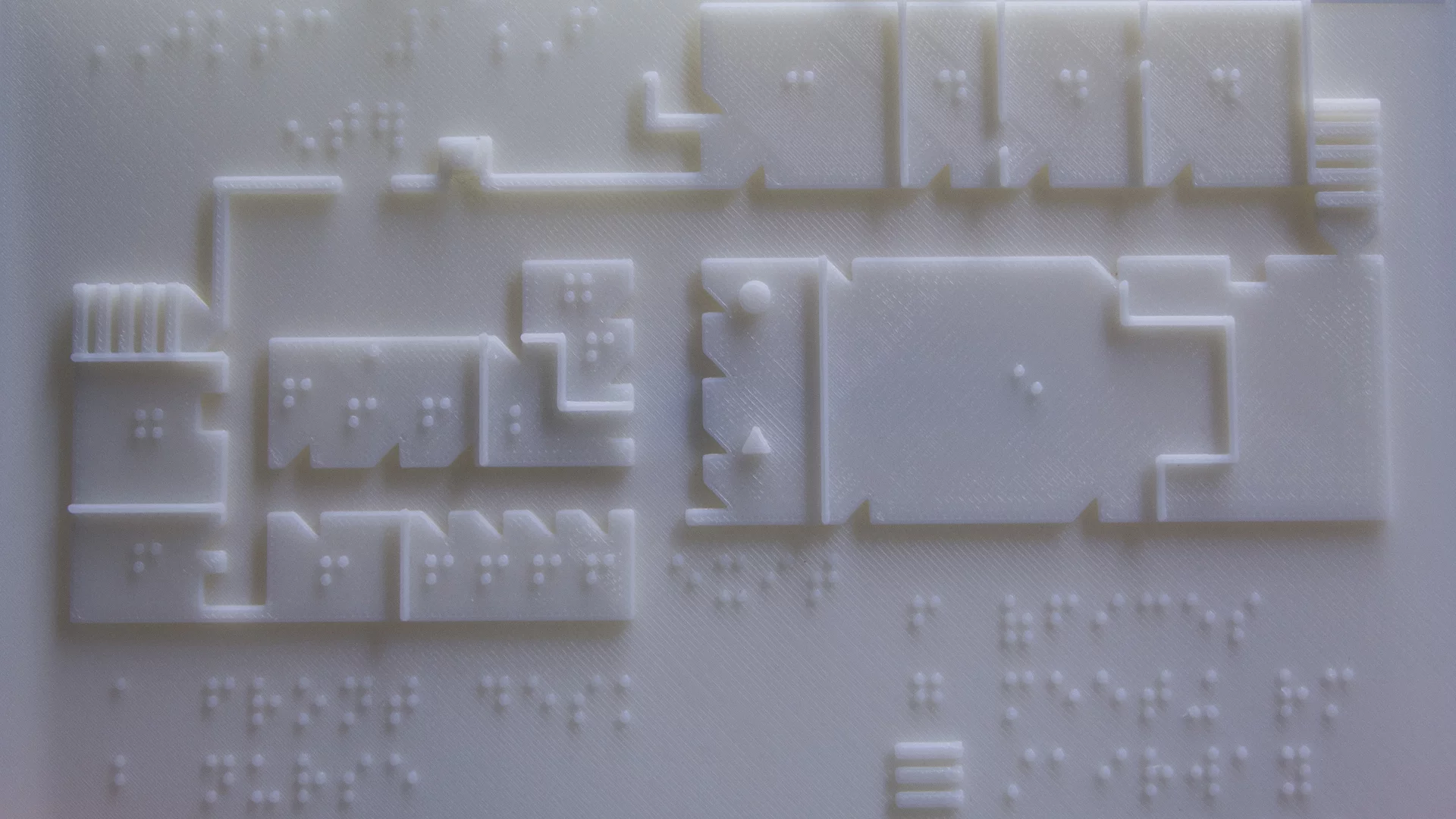 The 3D-printed braille maps provide students with the layout of each of the training center's three floors