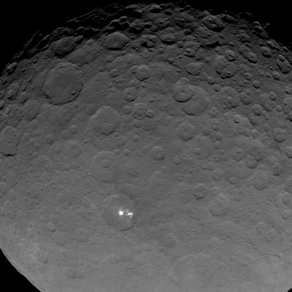 Ceres' Occator crater captured from a height of 4,500 miles (7,200 km) captured as Dawn transitioned to its second mapping orbit