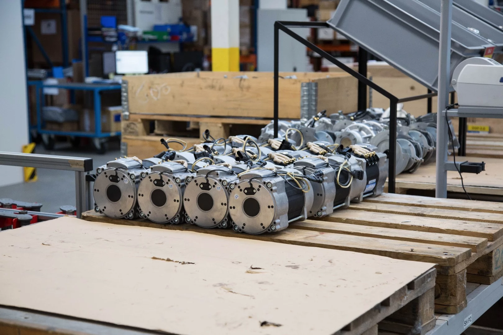 Electric motors for the Kyburz DXP on the floor of the factory