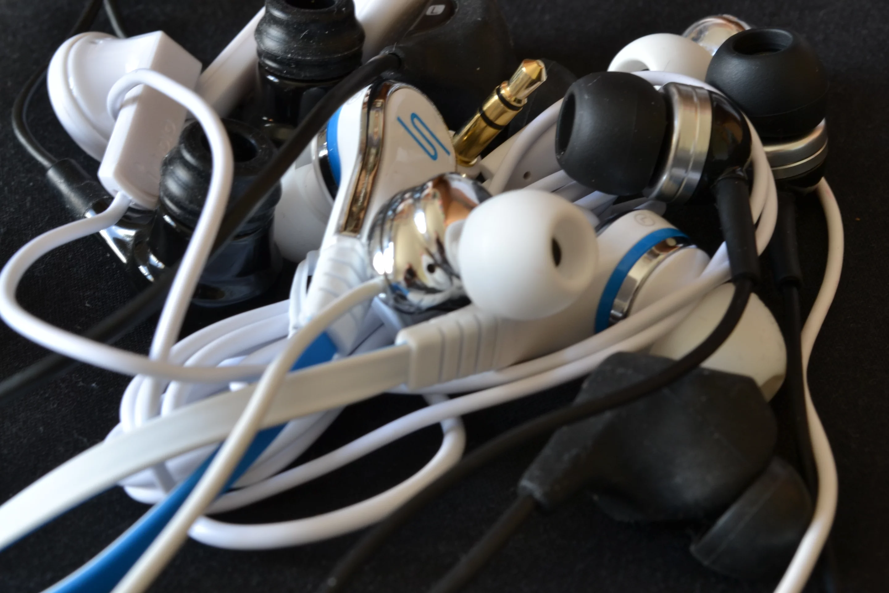 The collection of earphones used for comparison during the review