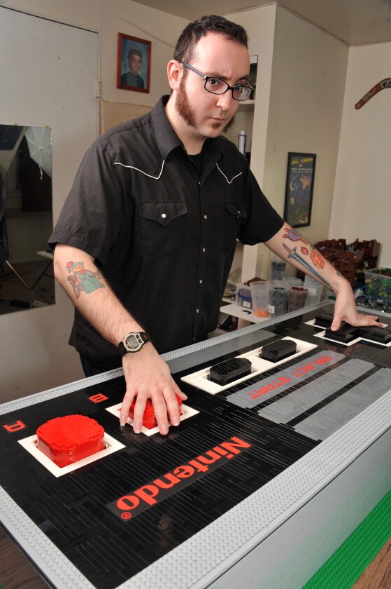 The giant LEGO NES controller is fully functioning, at least for those with long arms (Photo: Baron von Brunk by Gene Kennish)