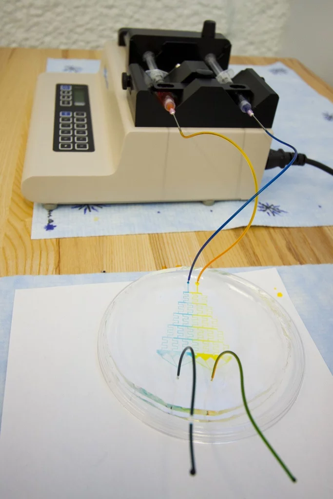 A high school physics teacher has invented a method of producing microfluidic devices, using little else than a photocopier and transparency film