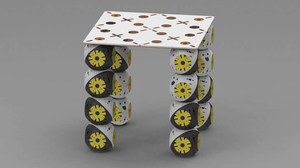 A miniature-table from Roombots modules and 4 plates (Image: Biorobotics Laboratory, EPFL)