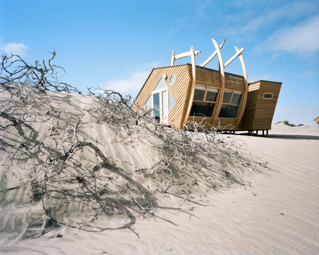 Inside the cabins at Namibia's Shipwreck Lodge, guests find a wood burner stove and an ensuite