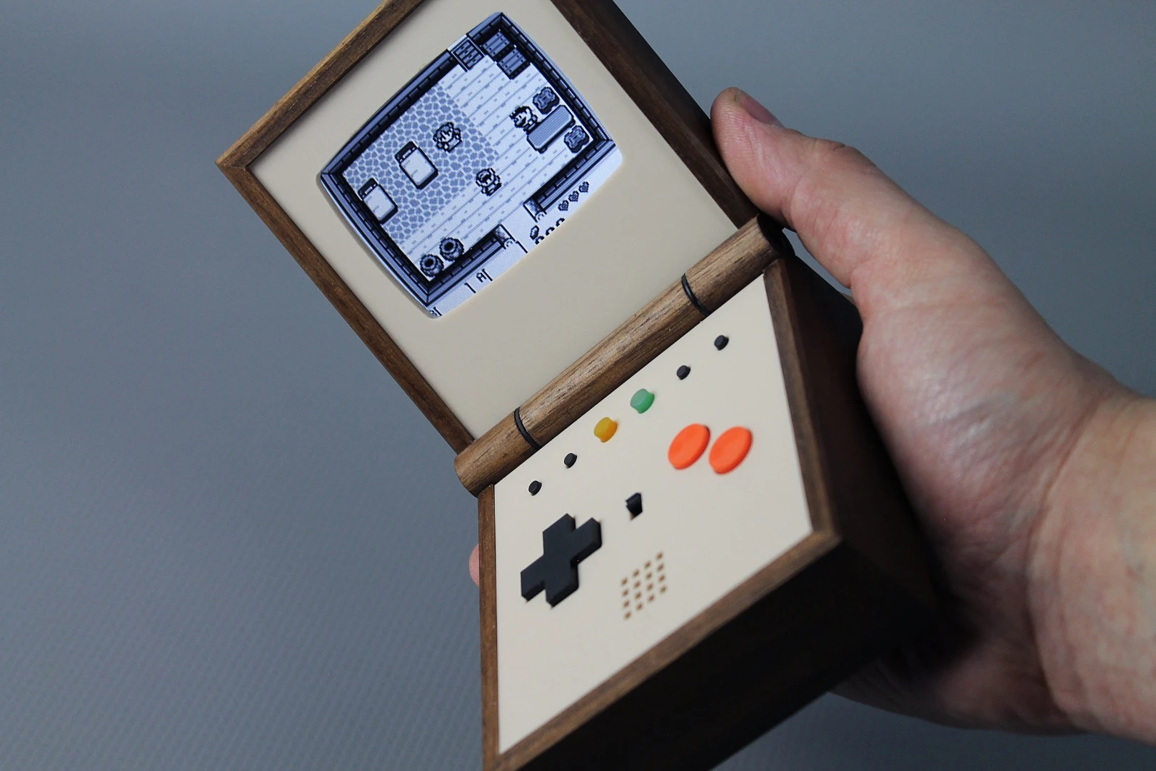 The Pixel Vision: A Game Boy replica fitted into a wooden box that can flip open