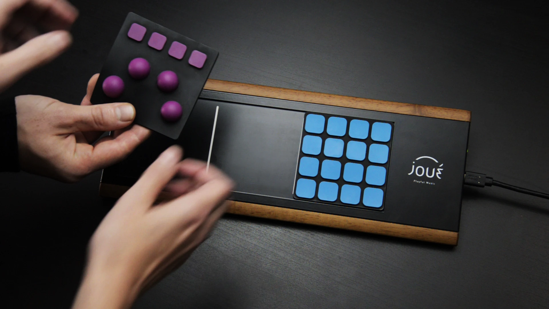 The Joué interface's main board senses pressure applied to the modules attached to the upper surface