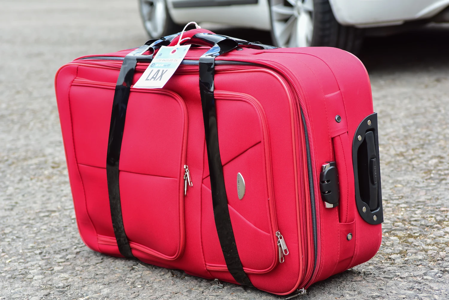 Adventure Tape keeps a suitcase with broken zipper shut