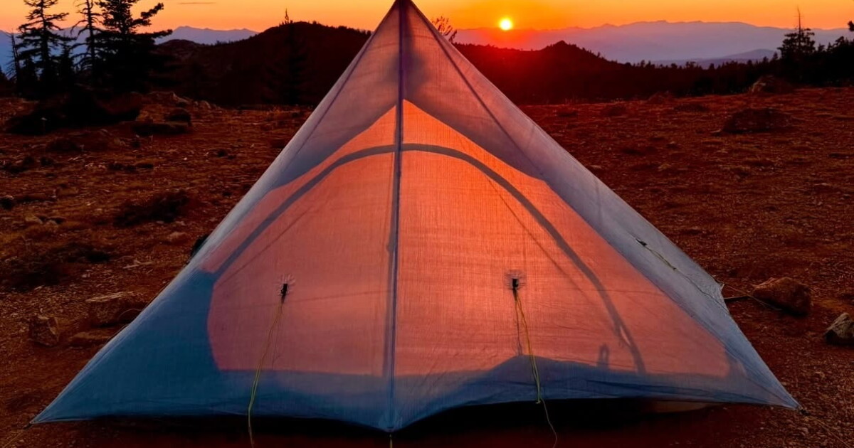 Feathery fast-zipping solo tent strips weight well under 1 pound