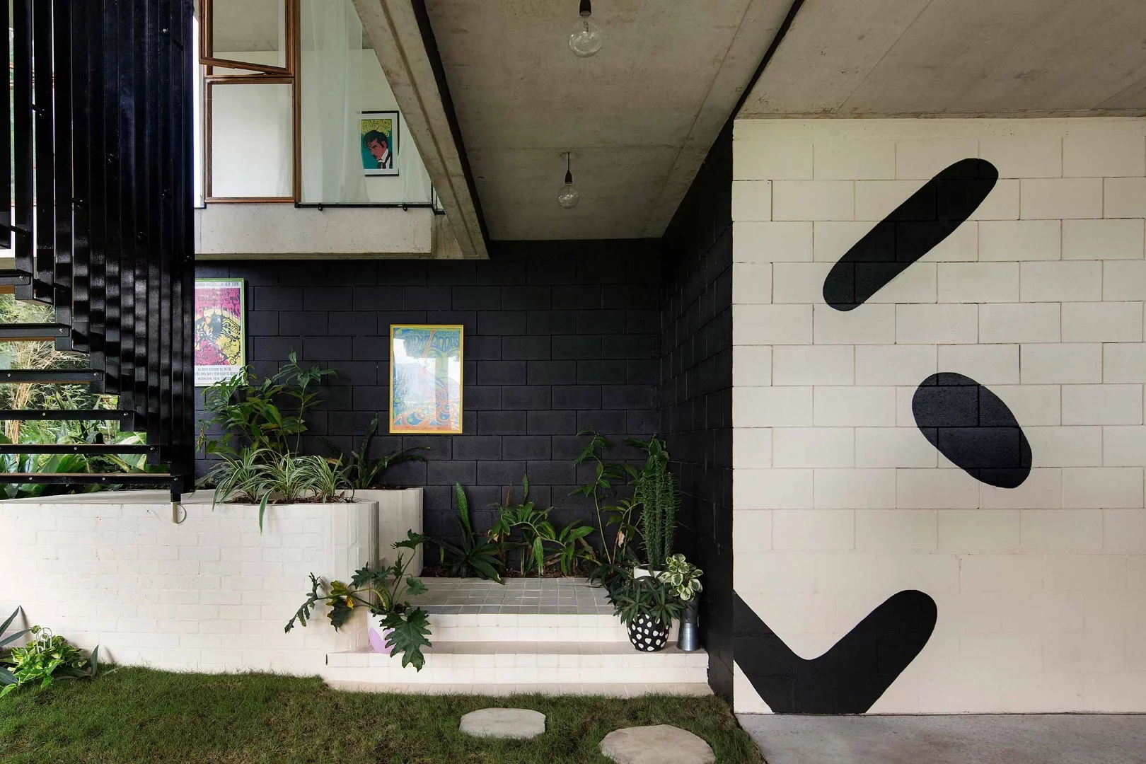 Staircase leading from the garage up to the entrance of the Planchonella House