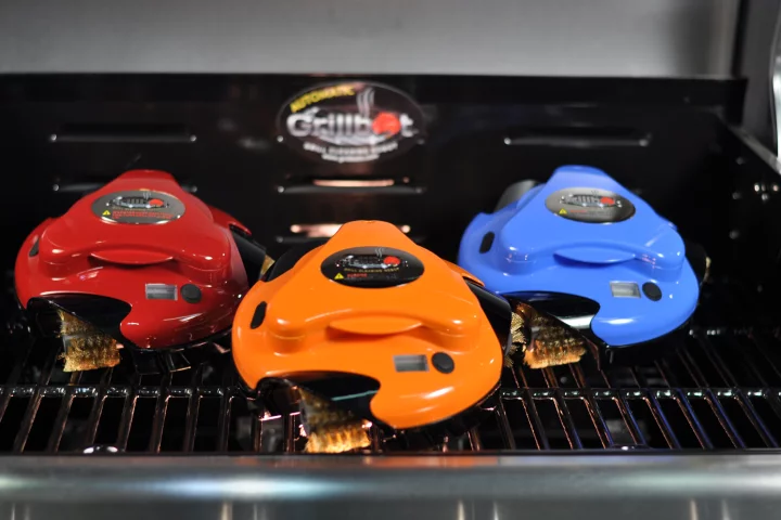 The Grillbot is a cute, single button operated bot that perches on your grill and lives to clean