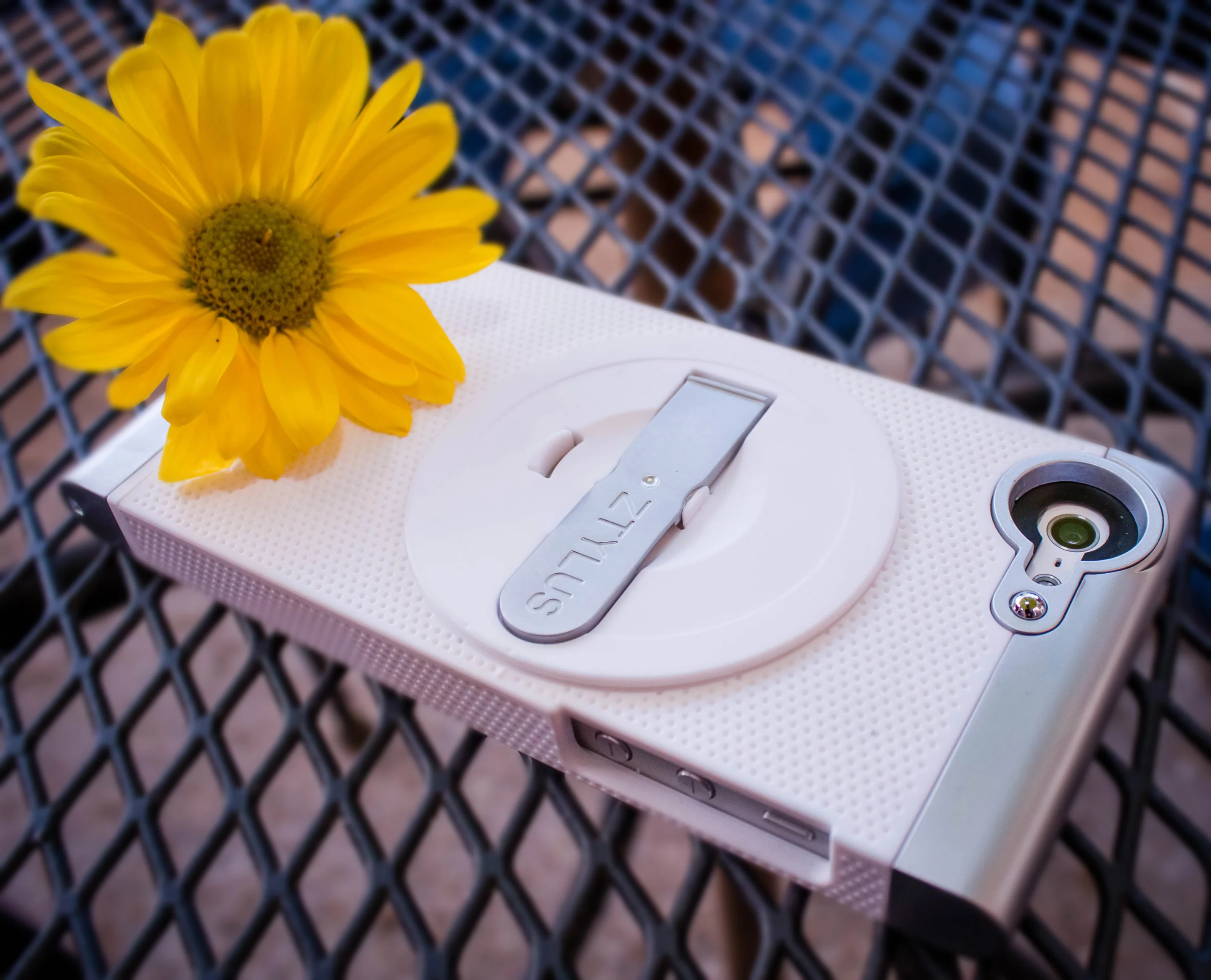 The circular cover that houses the two position aluminum kickstand can be removed to install the RV-2 Revolver lens kit