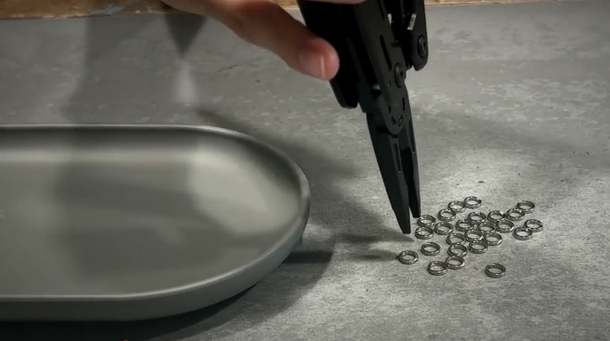 The fine needle-nose tips of the pliers provide precision grabbing