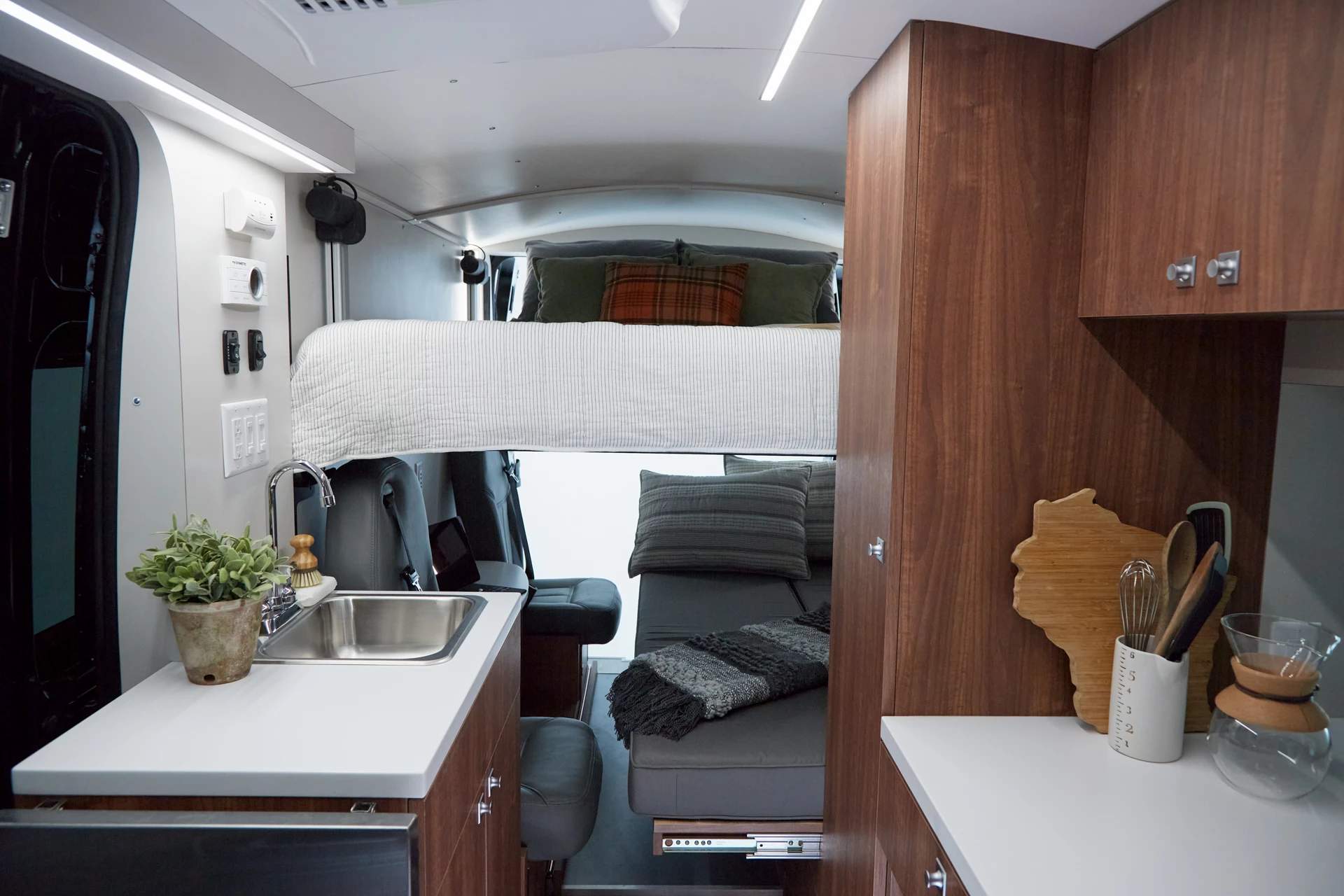 At night, the driver side sofa converts into a rather narrow double bed