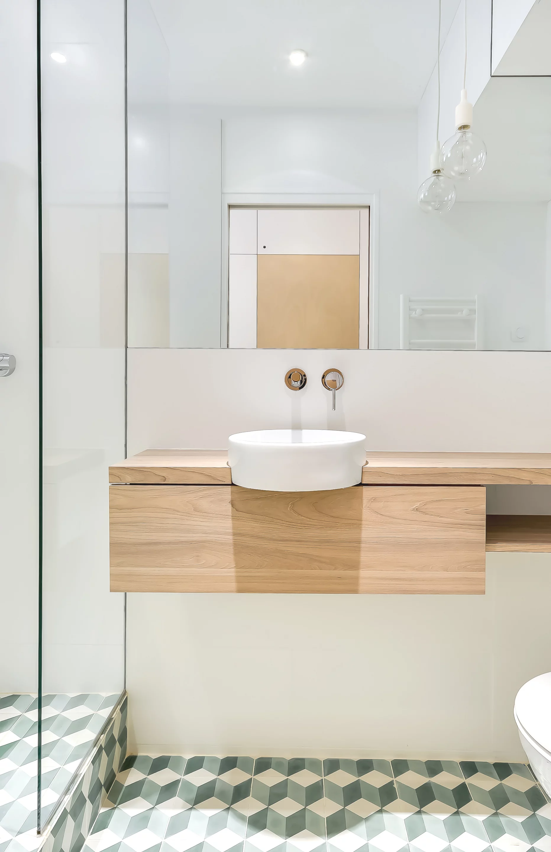 The bathroom measures just 2.3 sq m (24 sq ft) and includes toilet, sink, and shower but no bath (Photo: Meero)