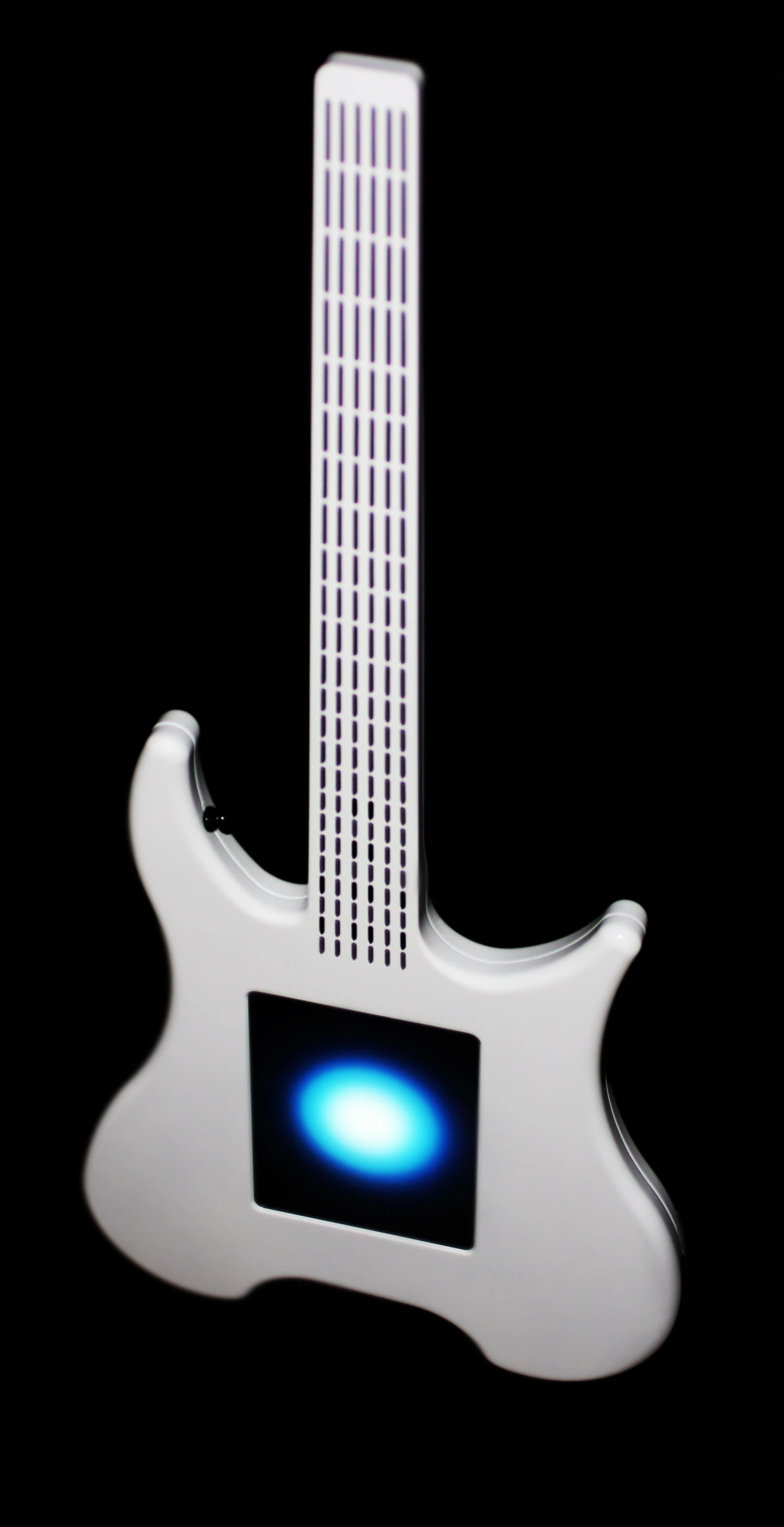 A player forms chord patterns or solo structures on the neck and then controls different aspects of the sound via the touchscreen interface