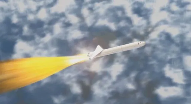 The booster rocket firing upon release from the aircraft