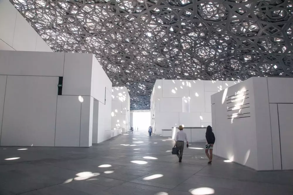 Visitors enjoy the exhibits at the Louvre Abu Dhabi