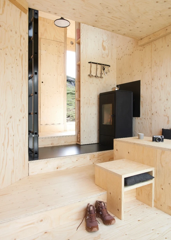 The On Mountain Hut is kept warm with a wood-burning stove