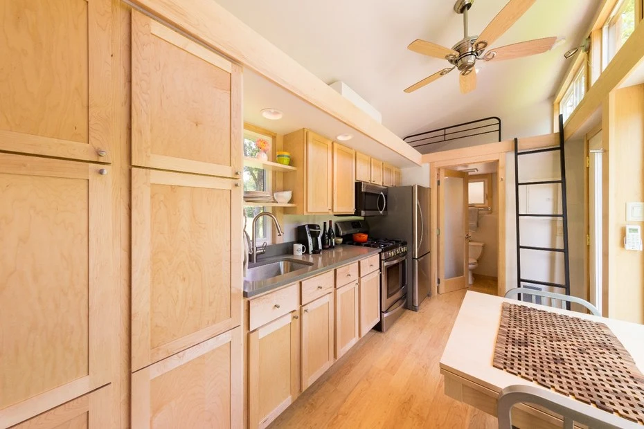 Juice for the Escape Traveler comes from a standard hookup and low-energy windows and closed cell foam insulation is installed throughout