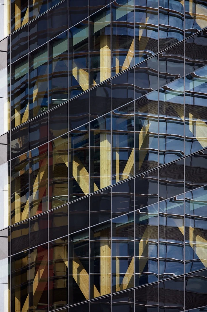 Billed as Australia's tallest timber structure, 25 King tastefully pairs its wooden skeleton with a shimmering glass facade