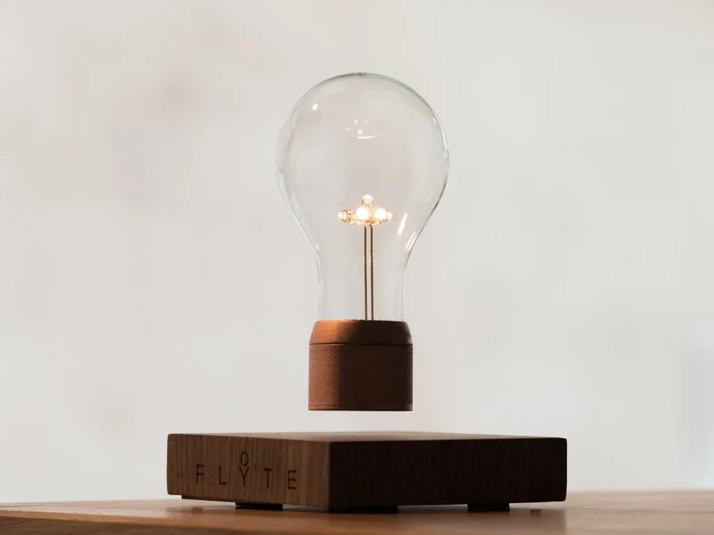 The Flyte lightbulb uses magnetic levitation and induction charging to hover wirelessly above its base