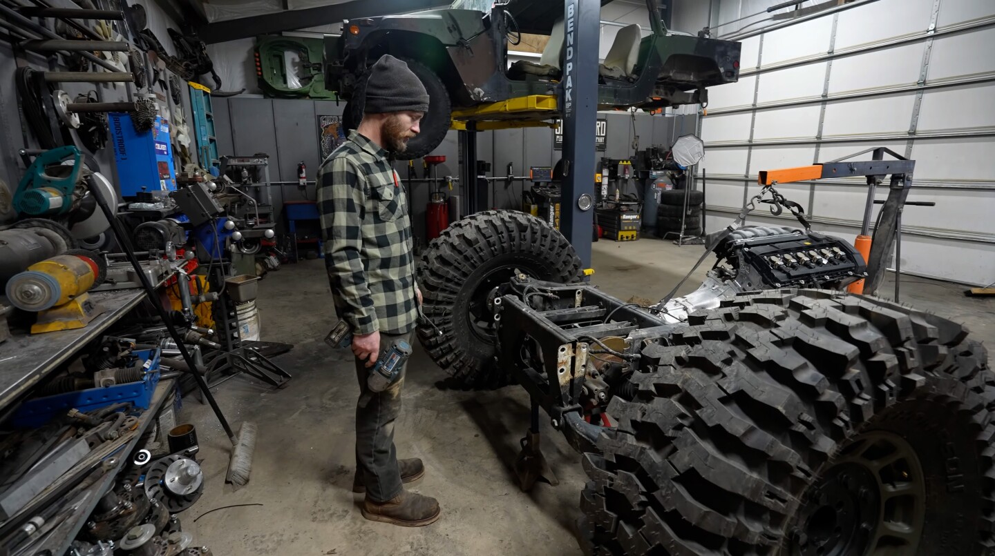 Ethan looking over the rear mockup of the trike as it begins to take shape