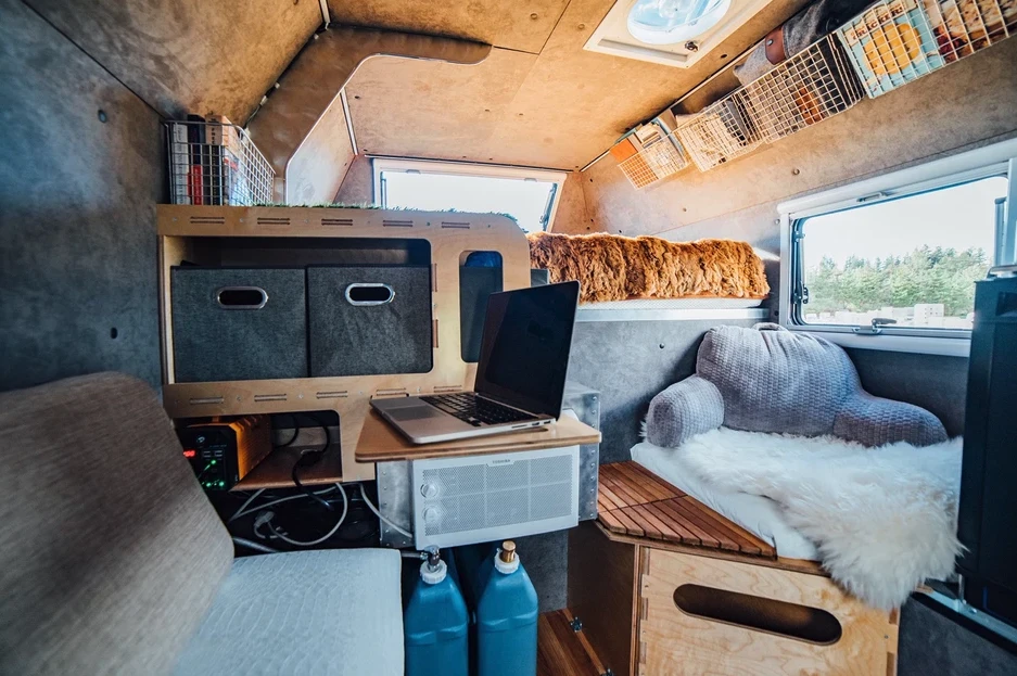 The available wooden storage unit with desk creates a cozy mobile office