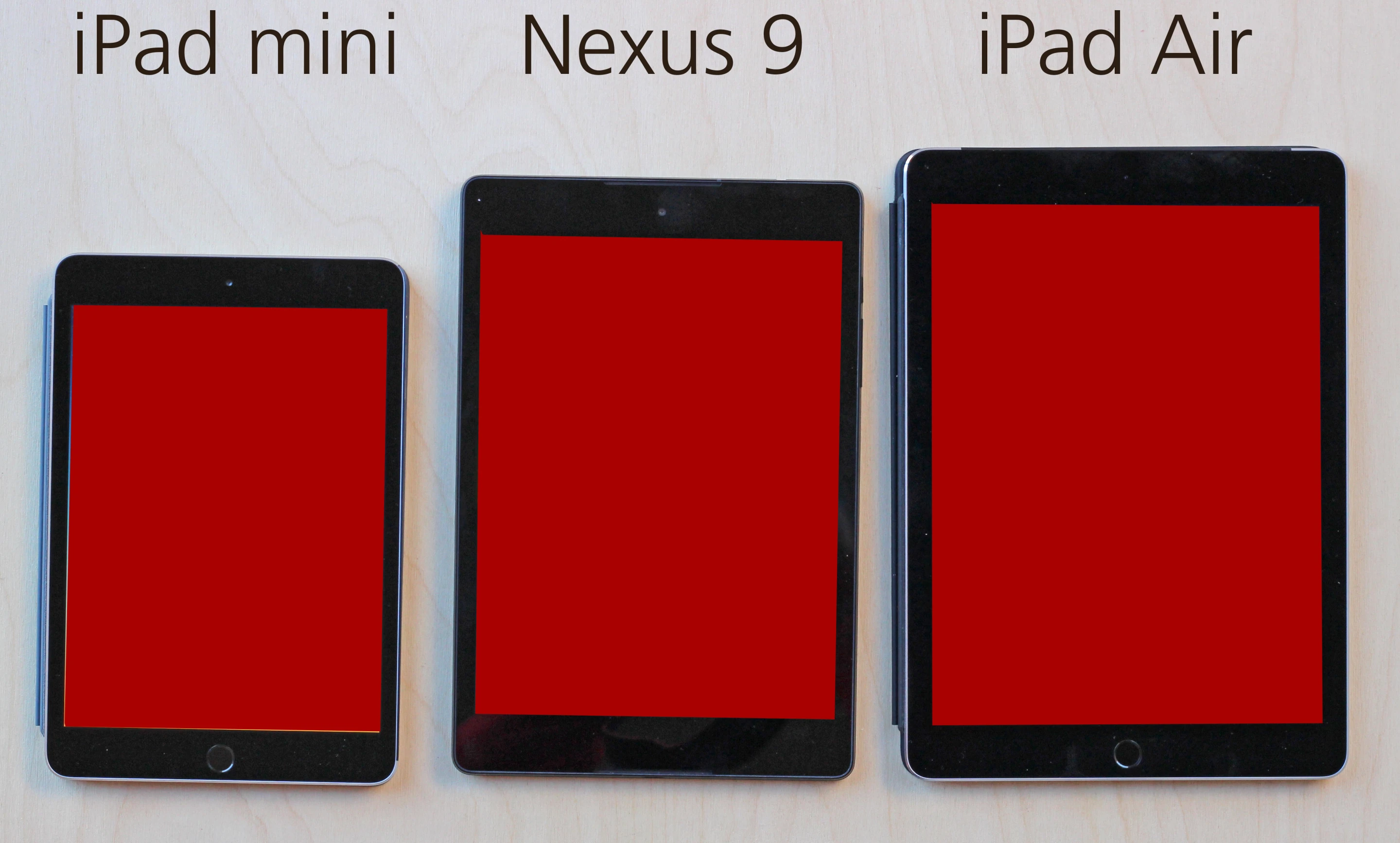 The Nexus 9, sandwiched between the latest iPads (Photo: Will Shanklin/Gizmag.com)