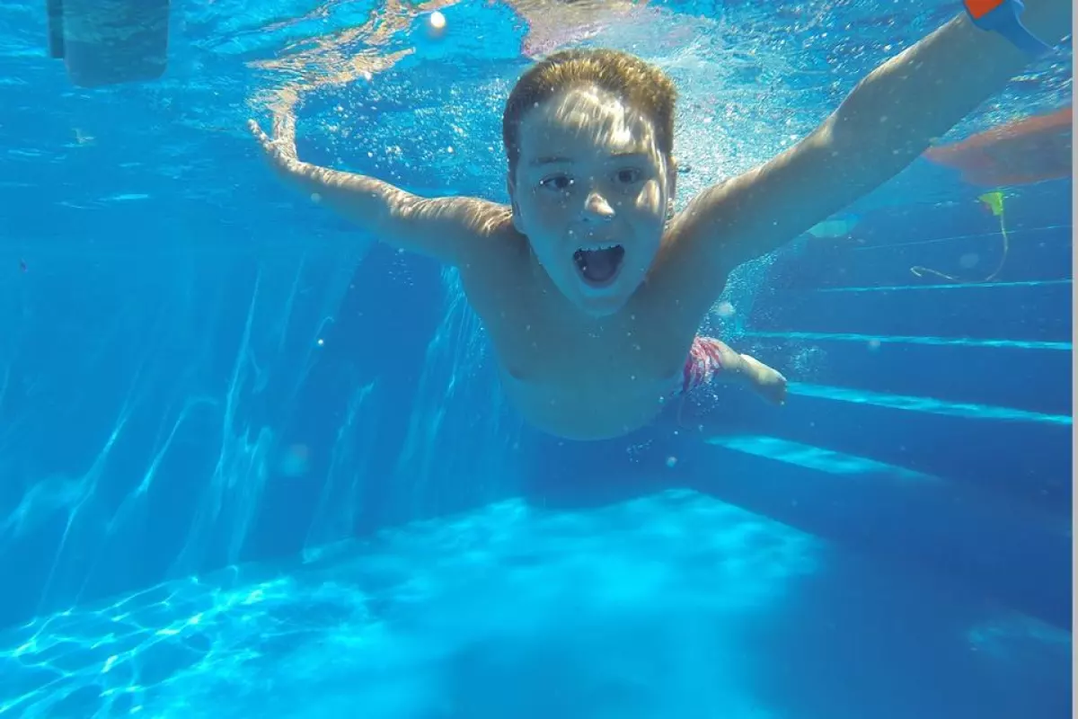 The Dolphin Alarm receiver unit (top left) and the wristband (top right)