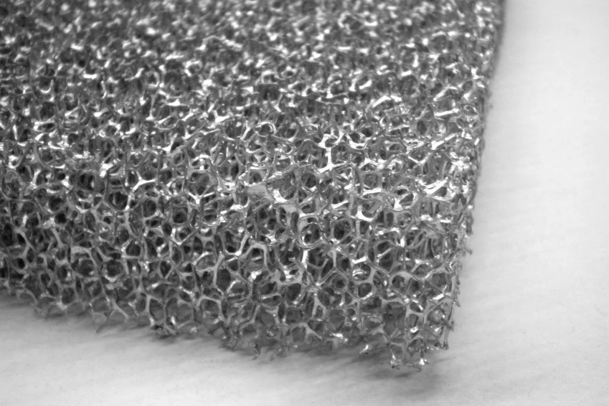 A close-up view of one of the metal sponges, which gets coated in wood fibers