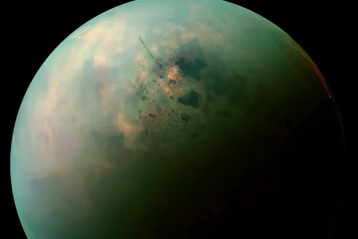 A near-infrared view of Titan's northern hemisphere, with the orange areas highlighting where crystals of butane and acetylene form as the weird oceans evaporate