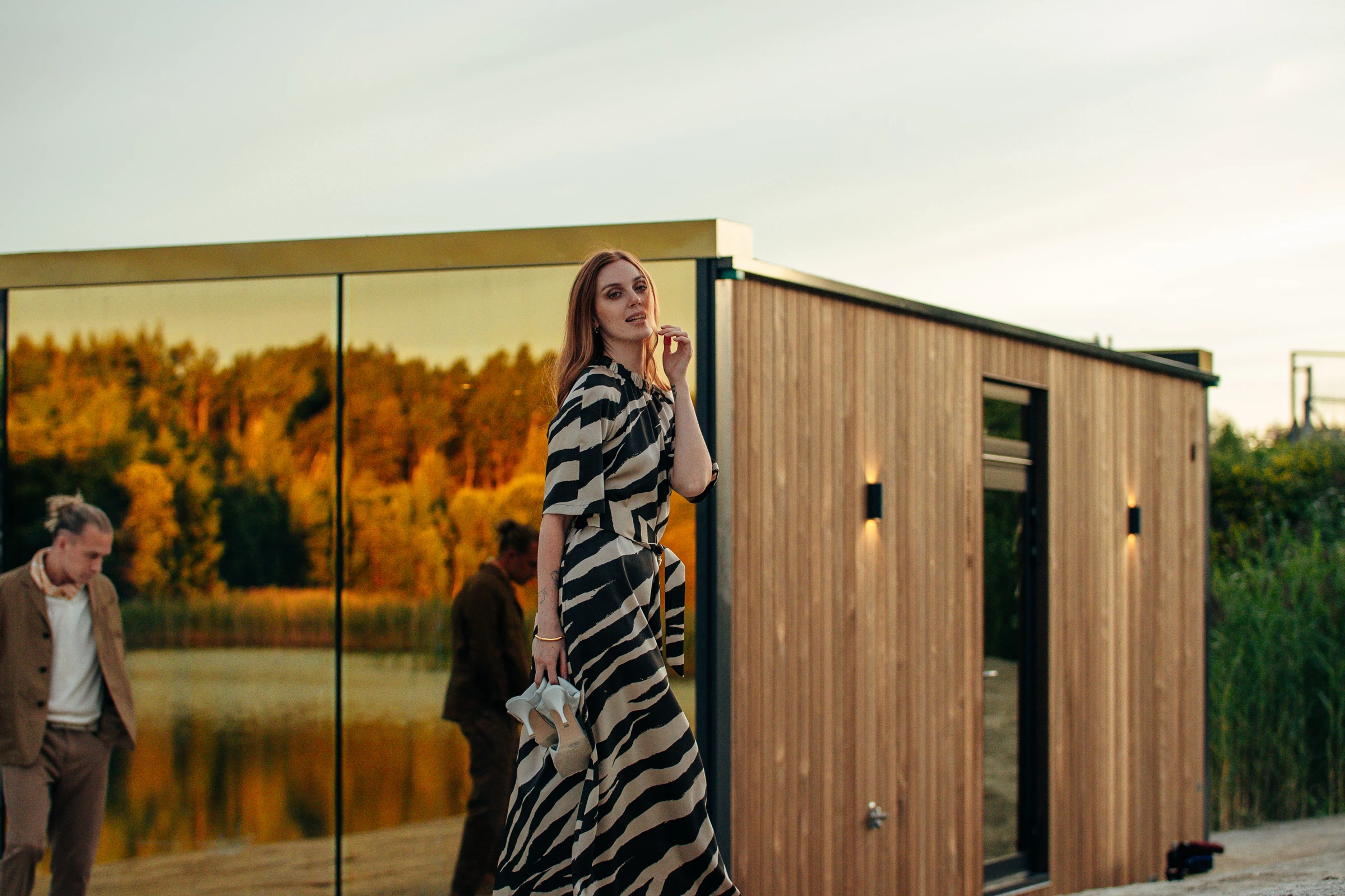 The Golden House also includes wooden cladding at its rear