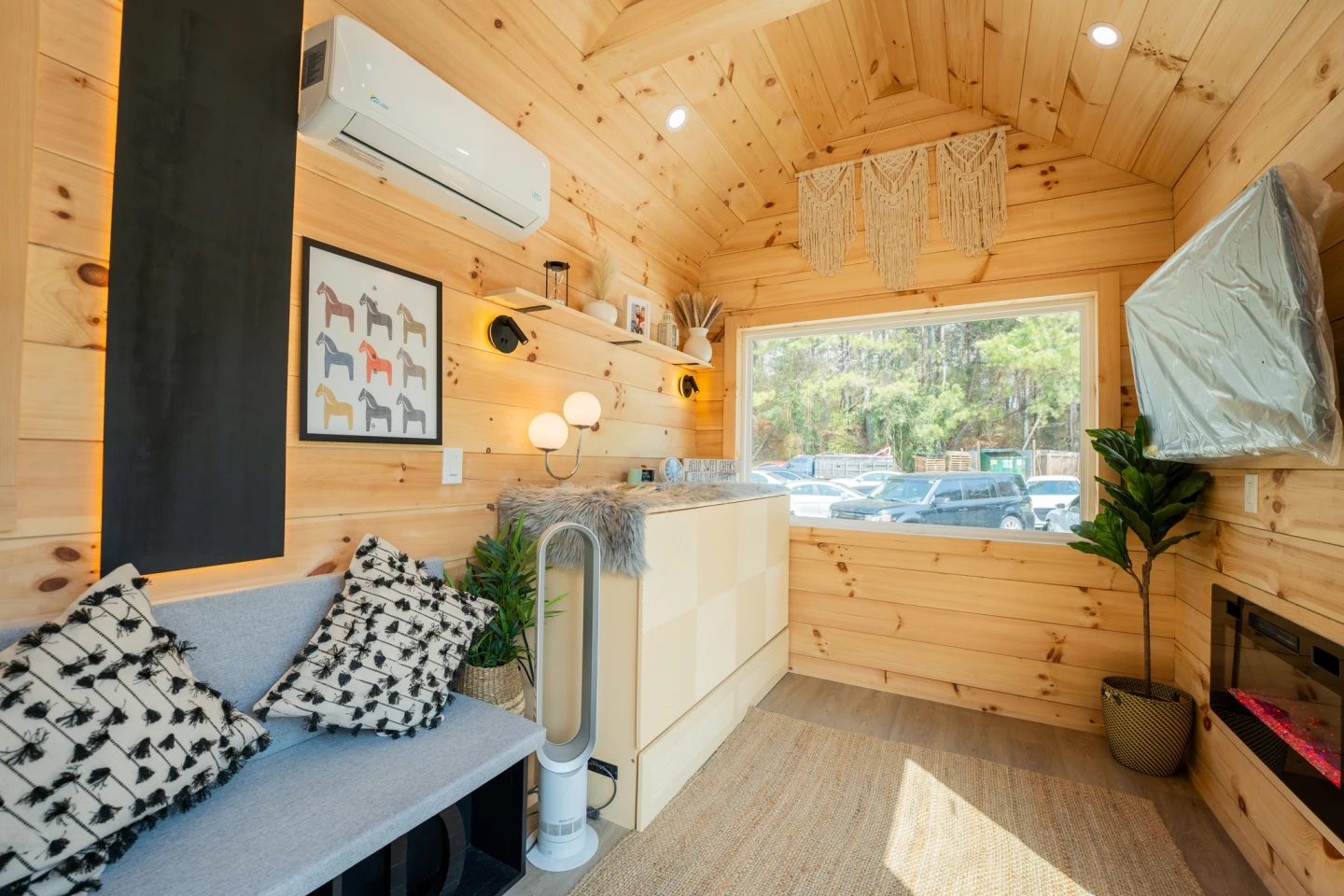 The Kemi's multipurpose room includes a Murphy style bed that folds away