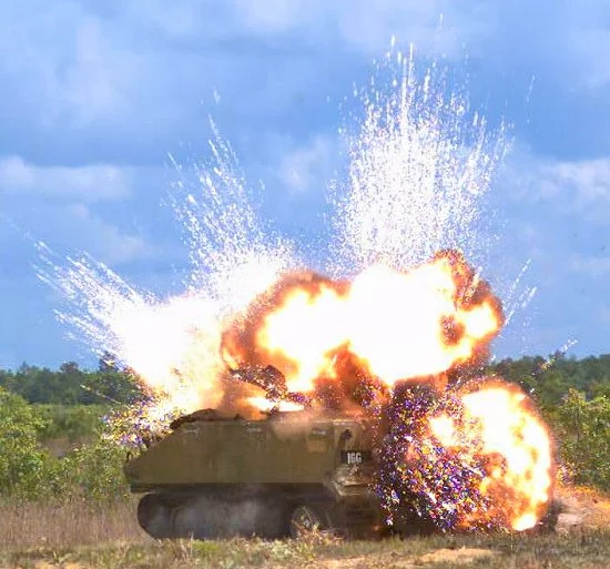 Detonation of a laser-guided warhead on an armored personnel carrier (Photo: Eglin AFB 780th Test Squadron)