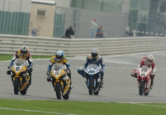 Corser, Kagayama, Pitt and Laconi in the early stages of Race One, take two!