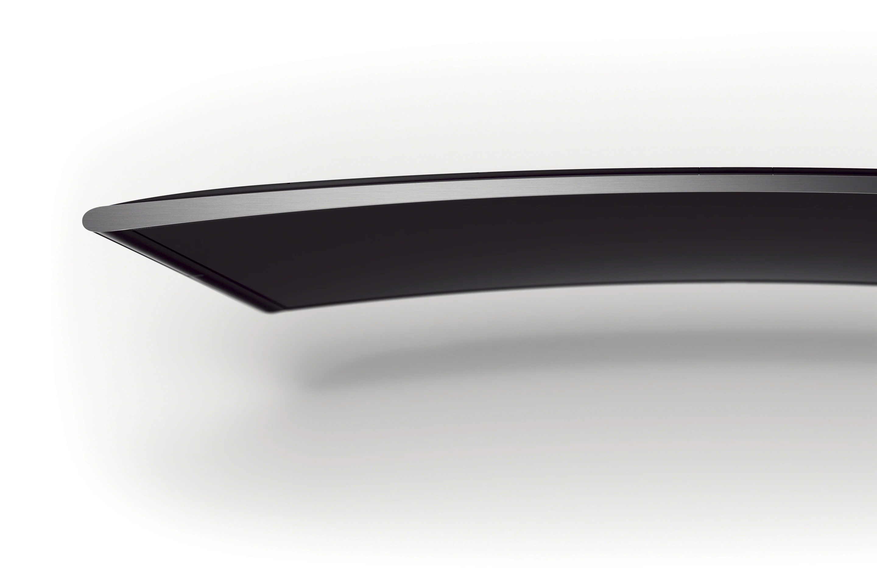 The S90's "precisely-calculated curve" looks to be somewhat less pronounced than the curve on models from LG and Samsung