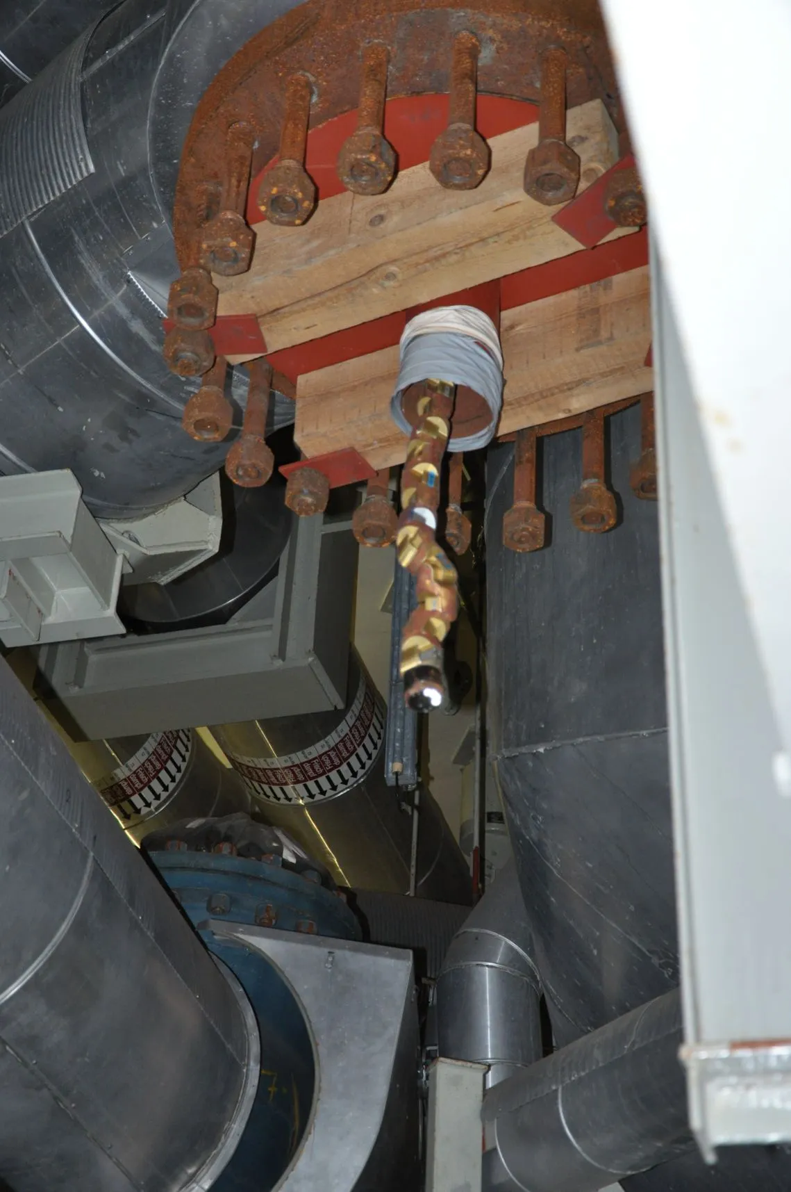 The modular snake robot peeks out of a pipe inside the Zwentendorf nuclear power plant