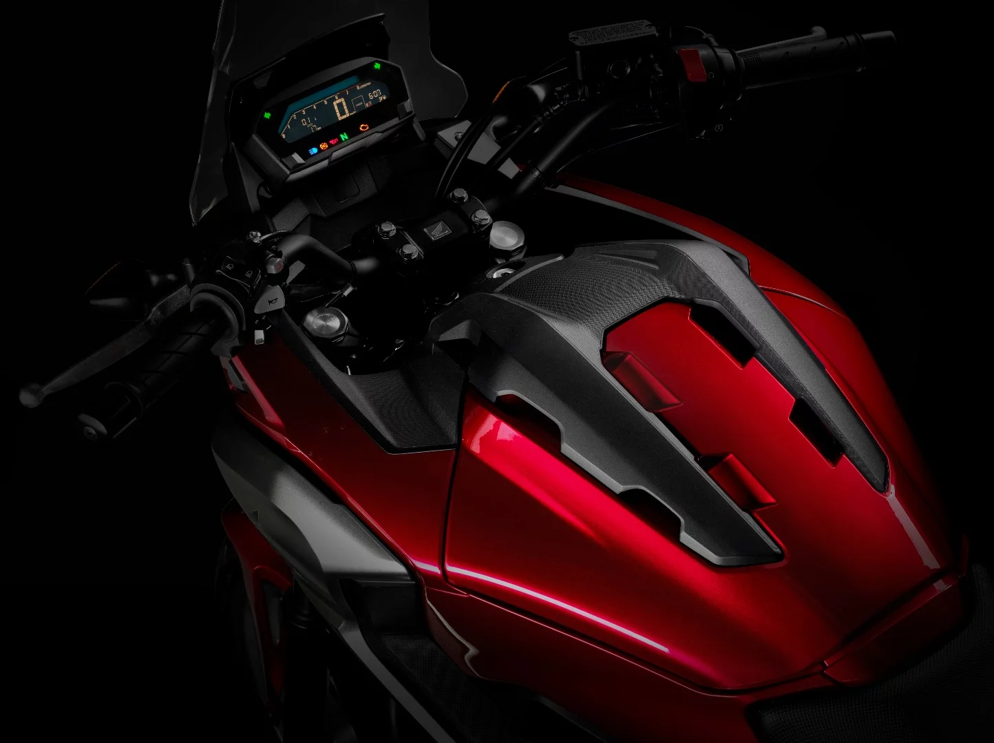 The trunk area in front of the rider is a very practical feature of the Honda NC750X and for 2016 it grows to 22 liters, one up from the previous model
