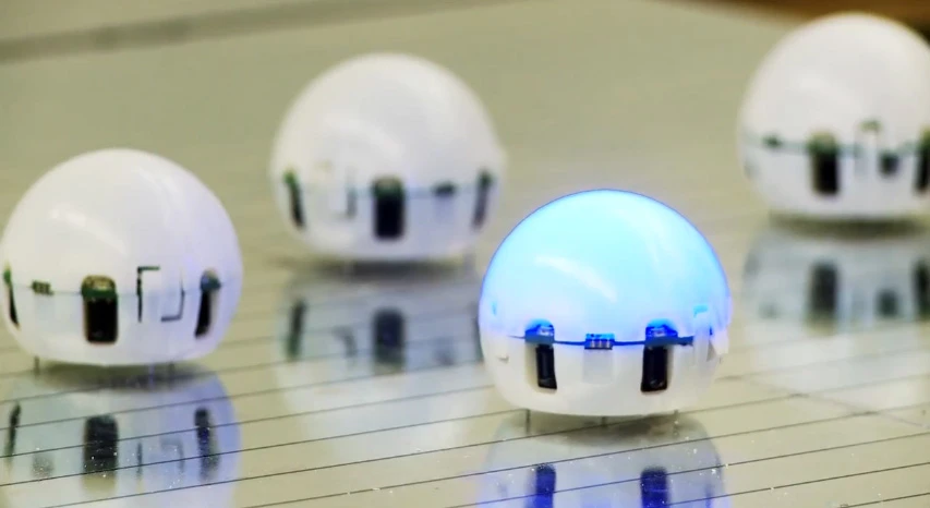 Small swarm robots, like these "Droplets" developed at the University of Colorado Boulder, work together to complete big jobs