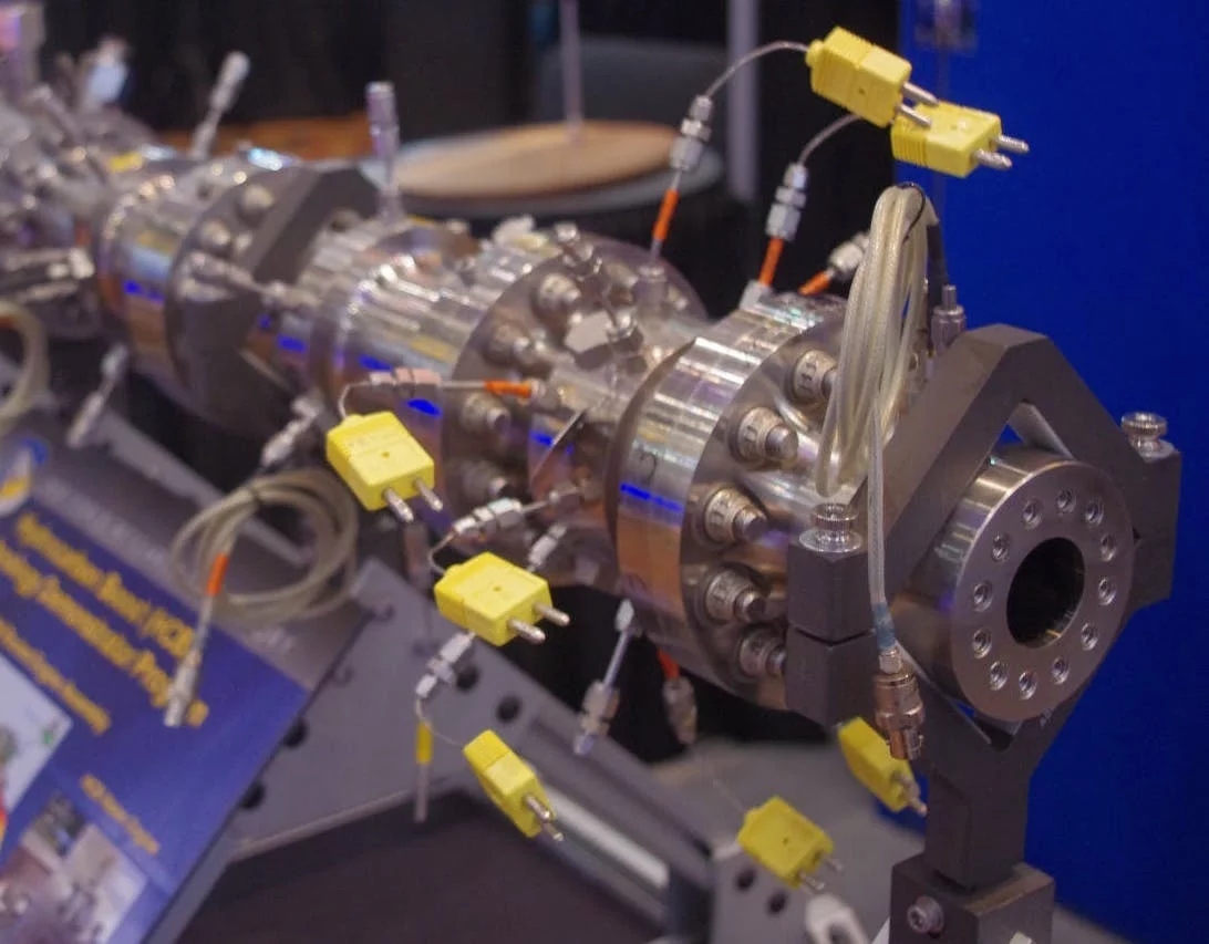 This is testing device from the Air Force Research Lab. "What this is doing is helping understand the oxygen-rich-stage combustion cycle," said AFRL representative Daniel Brown. "One of the challenges is that this cycle is very high pressure and the conditions are very harsh. We are trying to understand how this higher-performance cycle can feed into our next-generation launch systems."