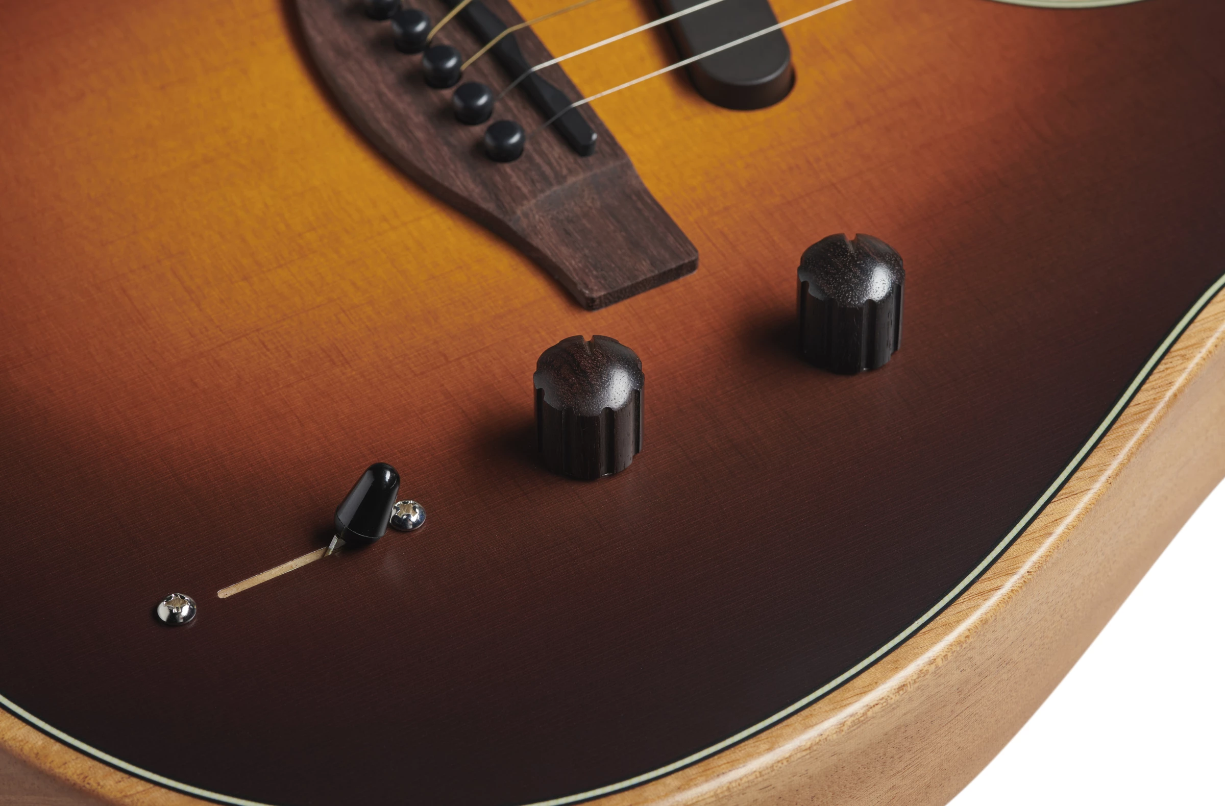 Tones are selected using a three-way blade switch, and blended using the control knobs