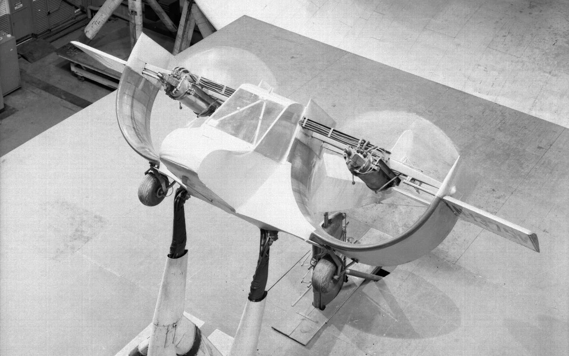 An experimental channel wing aircraft from the 1950s, being tested in a wind tunnel