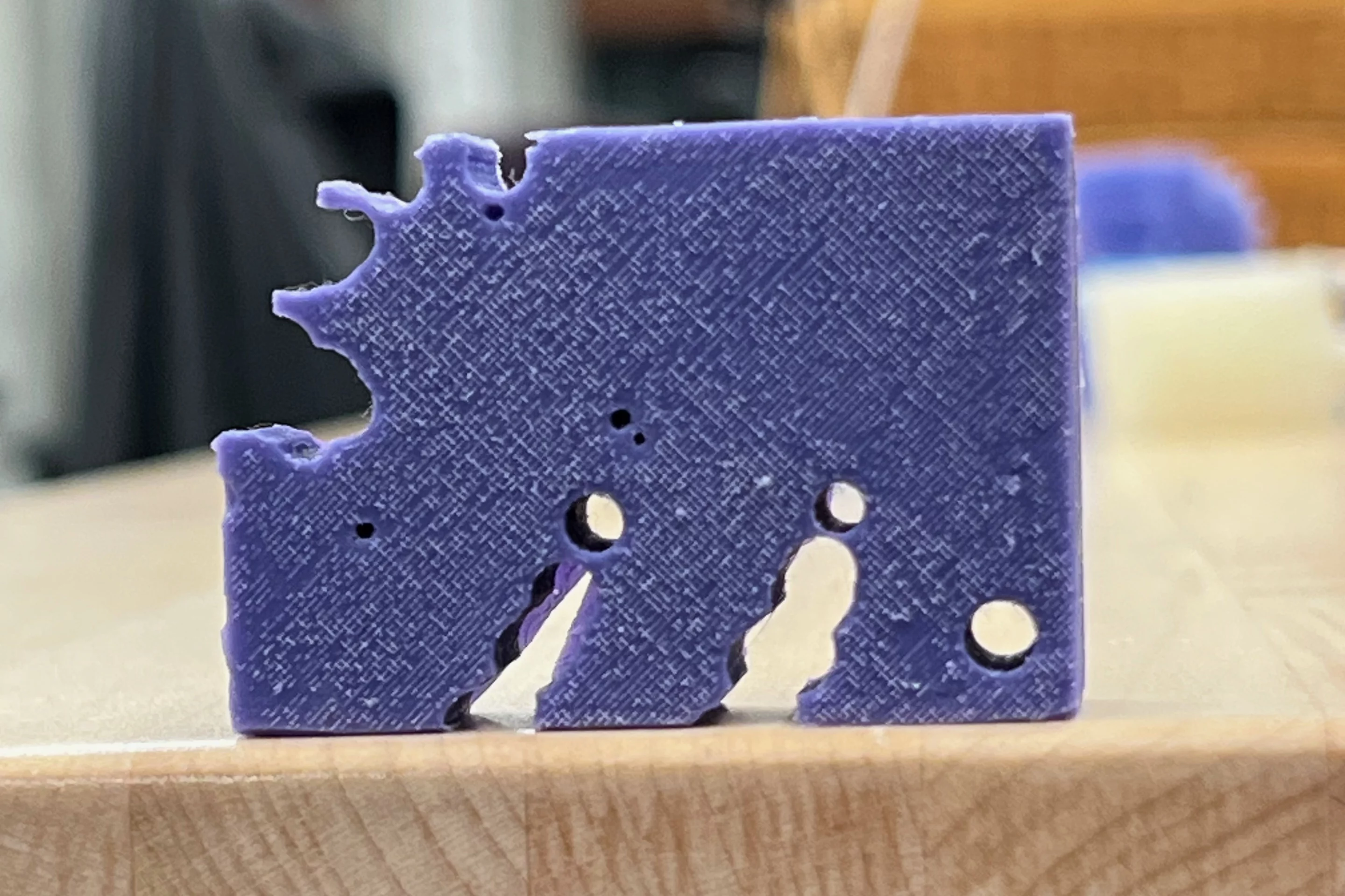 Although the purpose of the round holes is unknown, it is believed they may aid in flexibility as the robot moves its legs