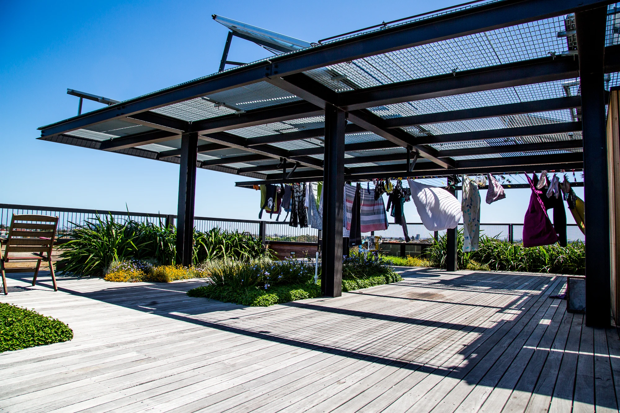 "The Commoners," residents go without personal laundries, using a row of six washing machines and a shared clothesline on the rooftop instead (Photo: Nick Lavars/Gizmag.com)