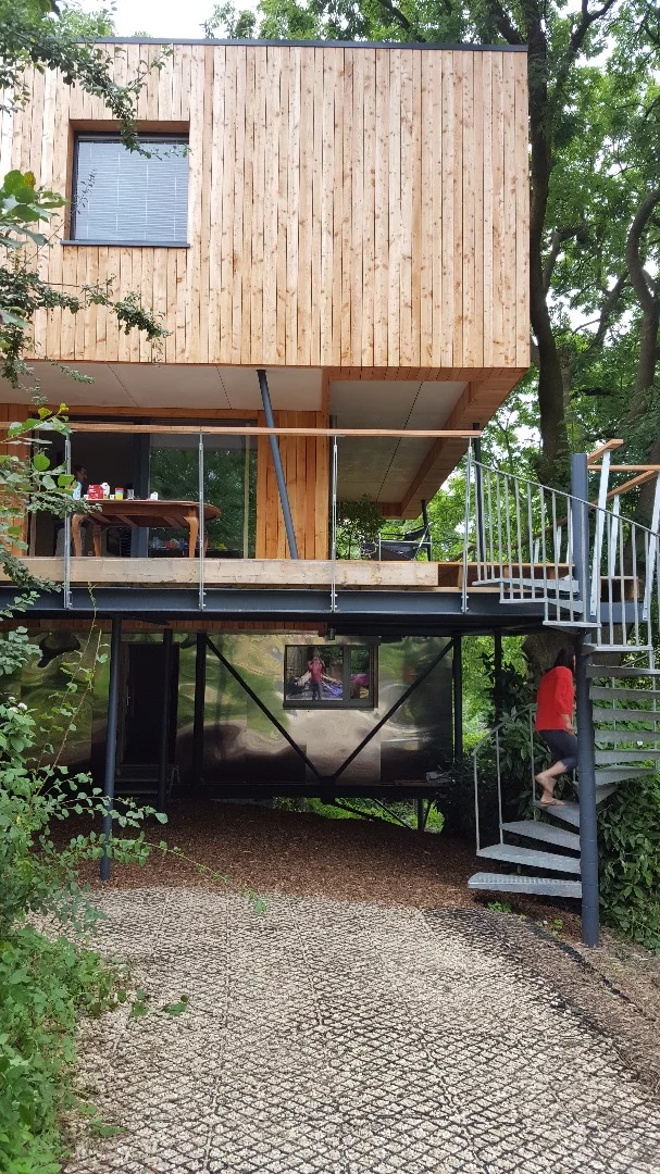 Dursley Treehouse is an elevated 200 sq m (2,152 sq ft) Passivhaus home