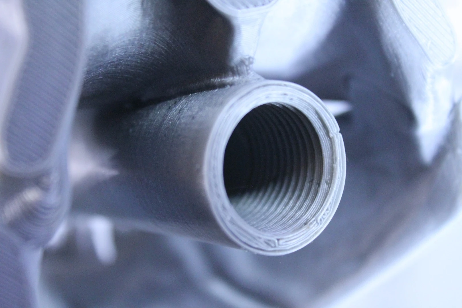 Even at middle quality, this shower head screwed on to a metal threaded pipe and didn't leak