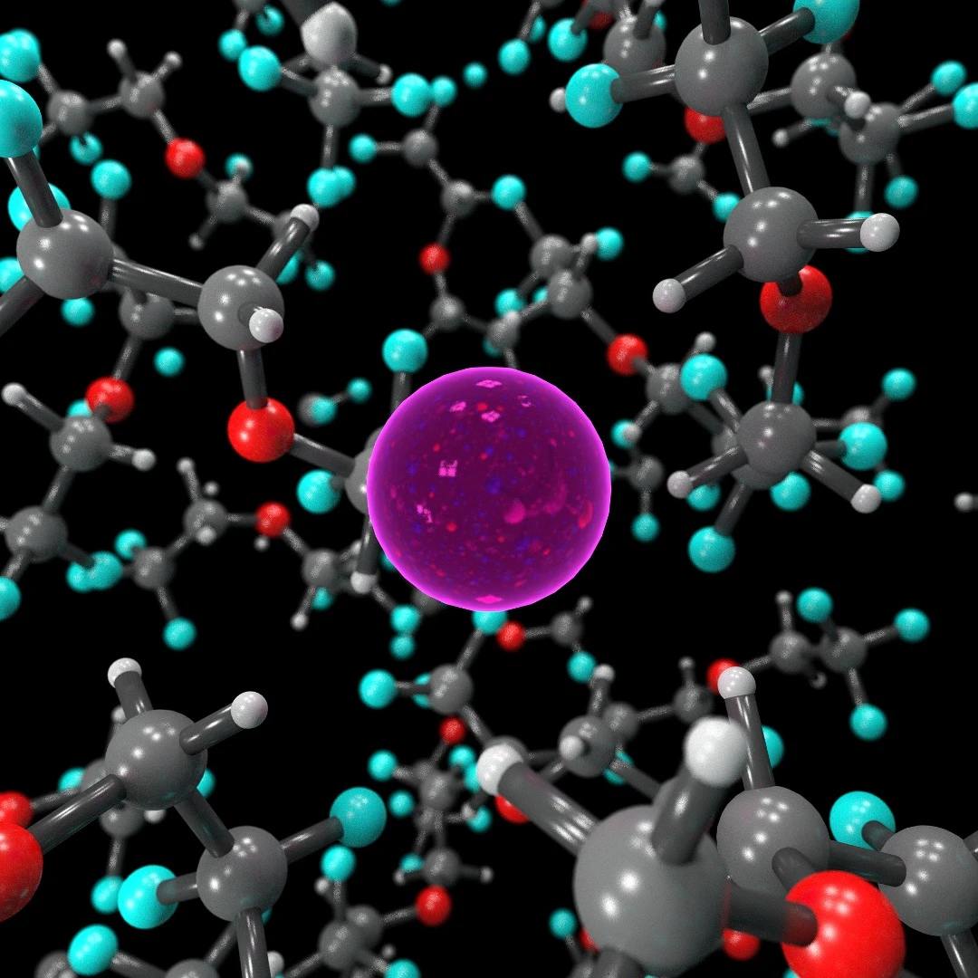 A fluoride ion (pink) floating in a liquid BTFE electrolyte