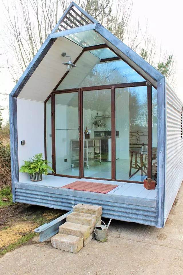 The shepherd's hut is accessed via small steps
