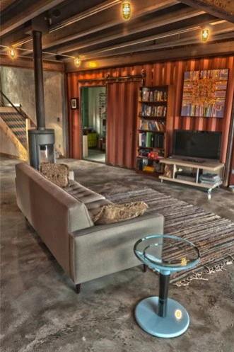 Though the architect hopes occupants will "question the need for excessive space," the interior appears spacious enough (cat-swingers take note)