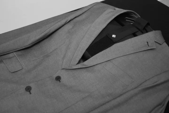 The Freefold commuter travel system is said to maintain the shape of a business suit jacket, tie, shirt and trousers